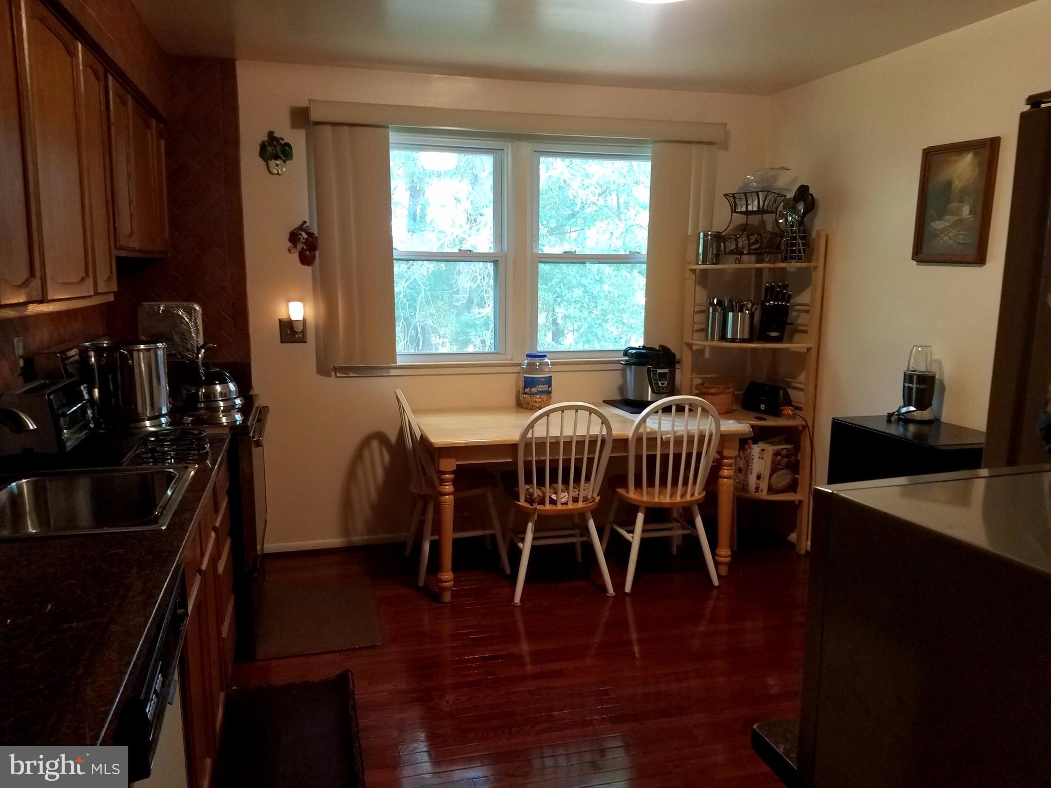 6901 Friendship Road Clinton, MD 20735 - Photo 9 of 26 a dining room with furniture and window