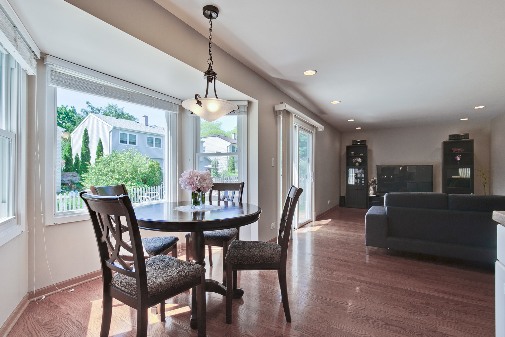 1300 Devonshire Road Buffalo Grove, IL 60089 - Photo 14 of 34 a view of a dining room with furniture window and wooden floor