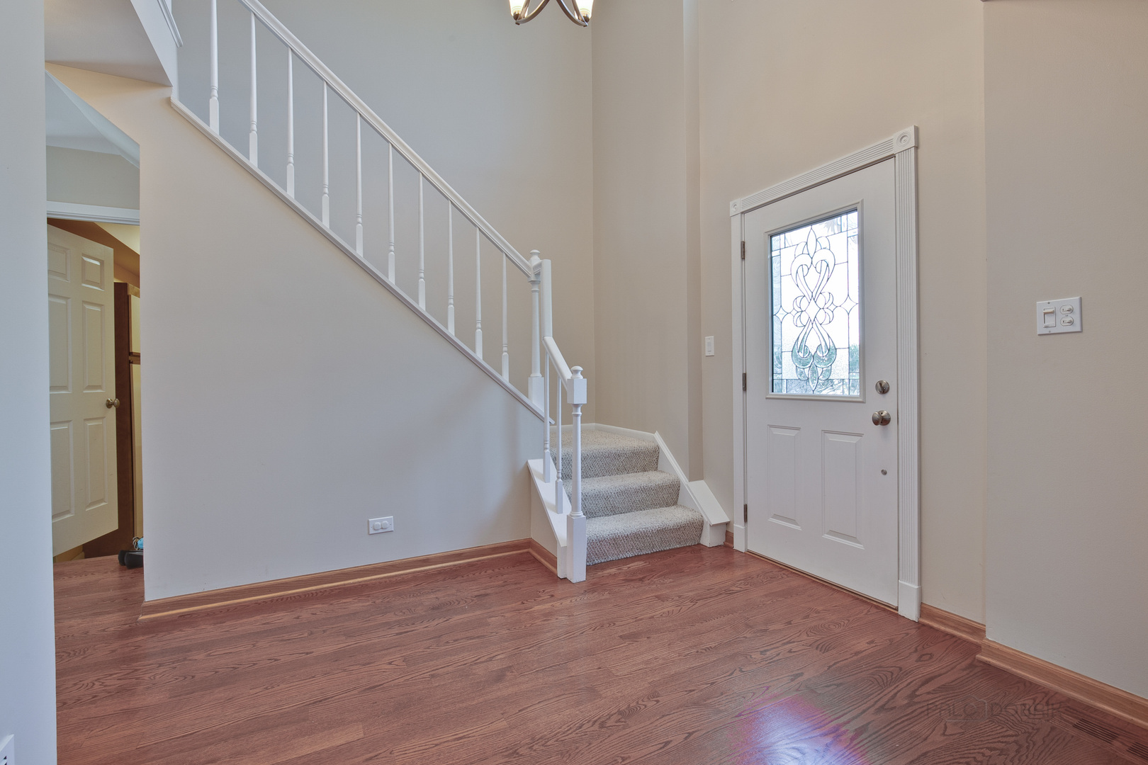 1300 Devonshire Road Buffalo Grove, IL 60089 - Photo 3 of 34 a view of entryway with wooden floor