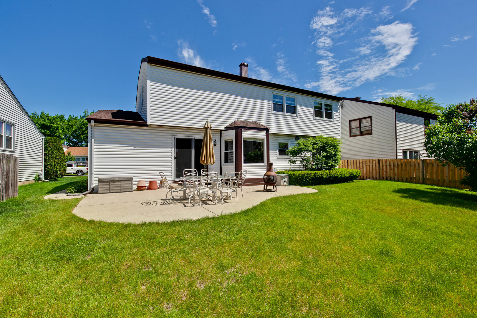 1300 Devonshire Road Buffalo Grove, IL 60089 - Photo 32 of 34 a view of house with backyard and patio