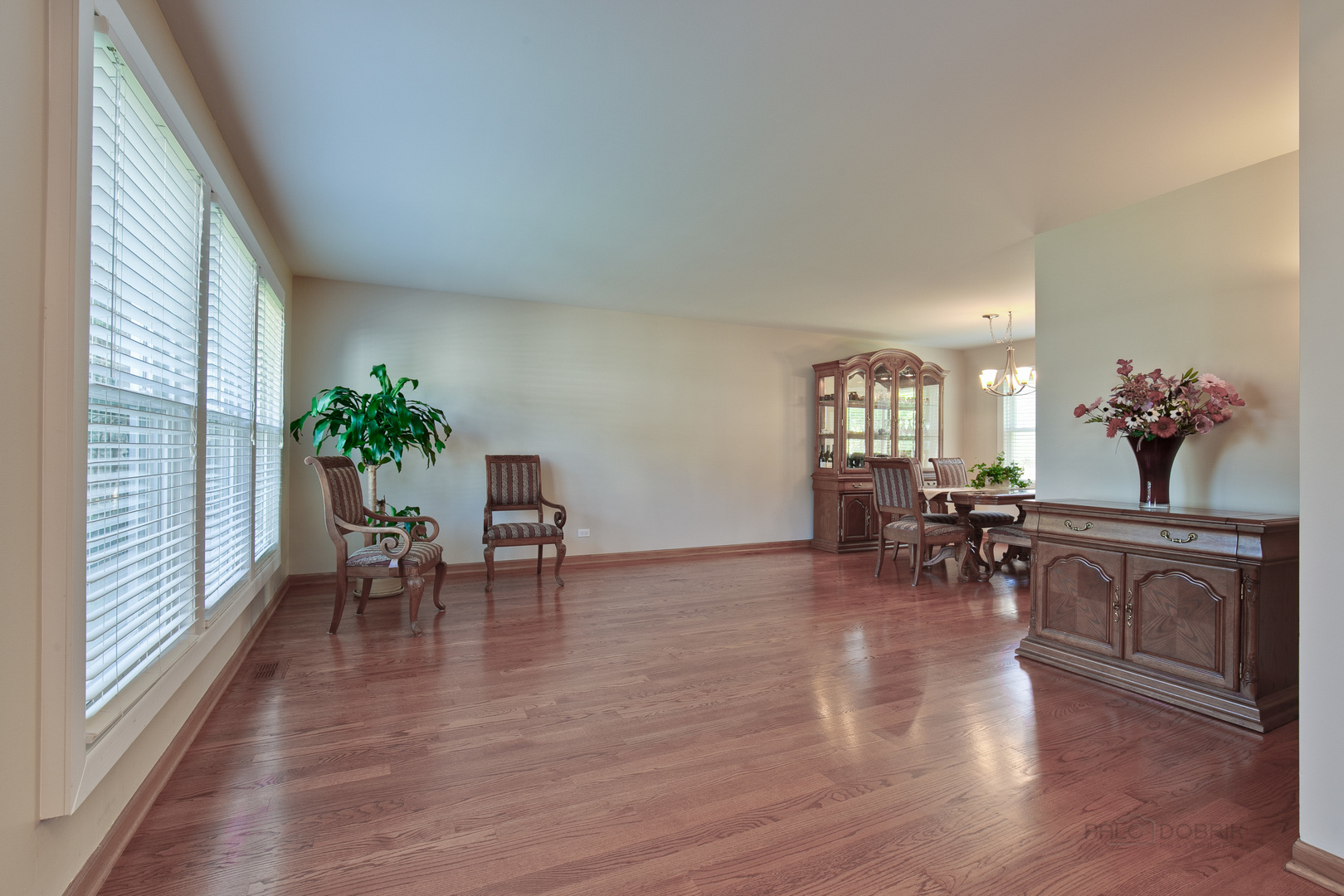 1300 Devonshire Road Buffalo Grove, IL 60089 - Photo 4 of 34 a view of a dining room with furniture and chandelier