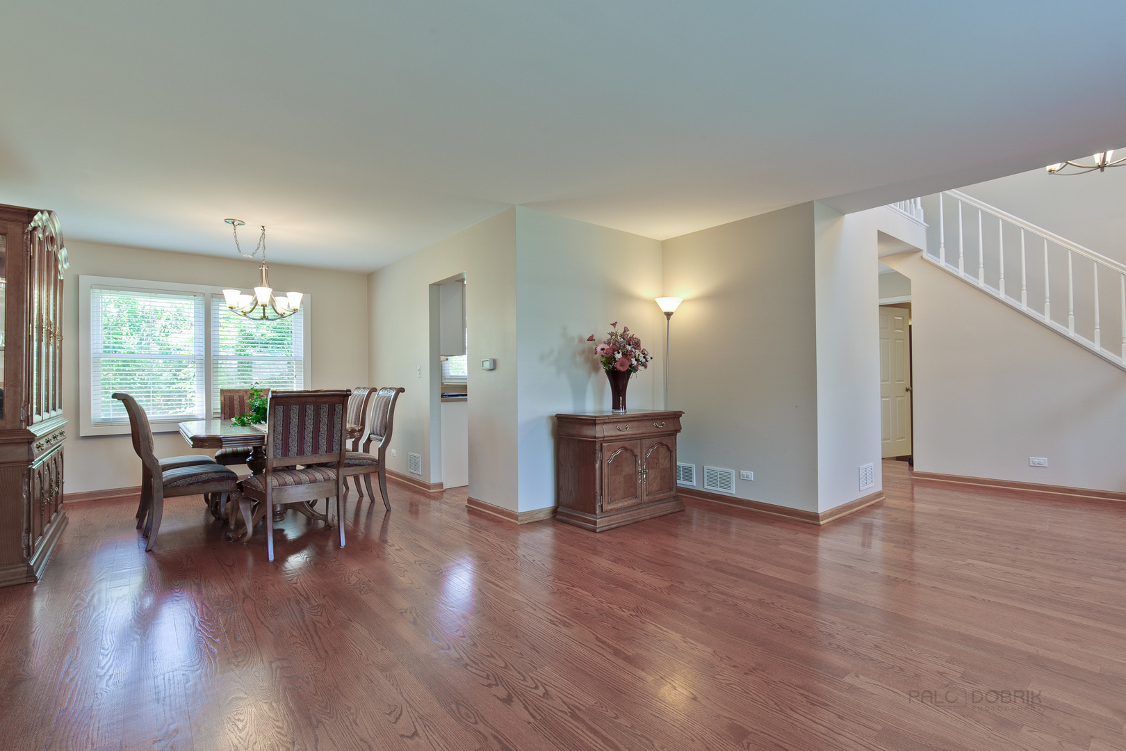 1300 Devonshire Road Buffalo Grove, IL 60089 - Photo 6 of 34 a view of a dining room with furniture and wooden floor