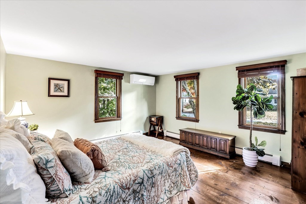 56 Danas Path Yarmouth, MA 02673 - Photo 16 of 32 a bedroom with bed and window