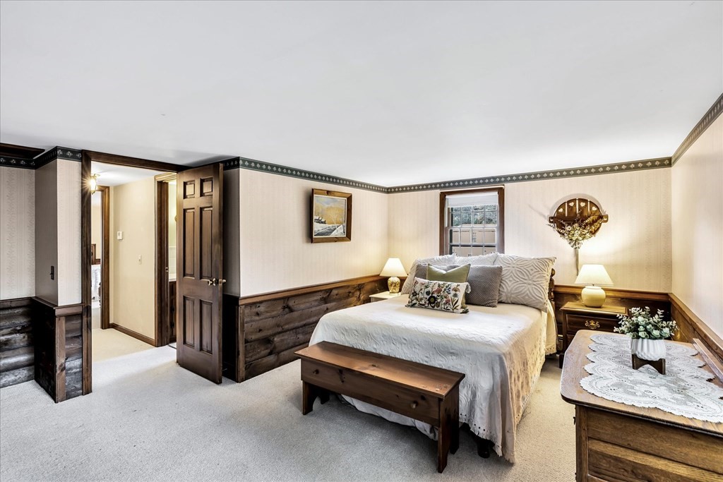 56 Danas Path Yarmouth, MA 02673 - Photo 27 of 32 a bedroom with furniture and a window