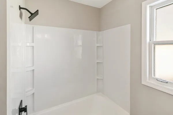 a bathroom with a bathtub