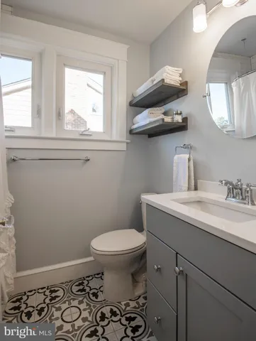 a bathroom with a sink and a toilet