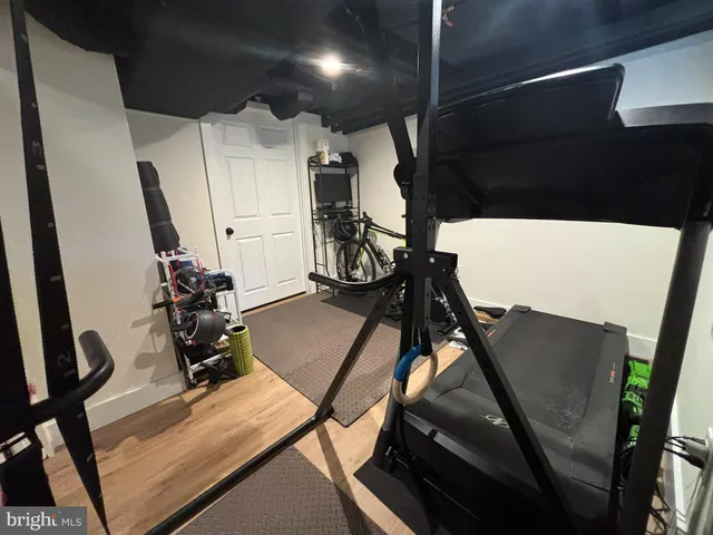 a view of a table and chairs on the roof deck