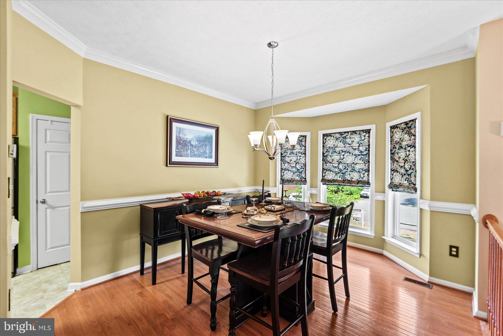 302 Forest Avenue Colonial Beach, VA 22443 - Photo 19 of 56 Dining Room with Bay Windows