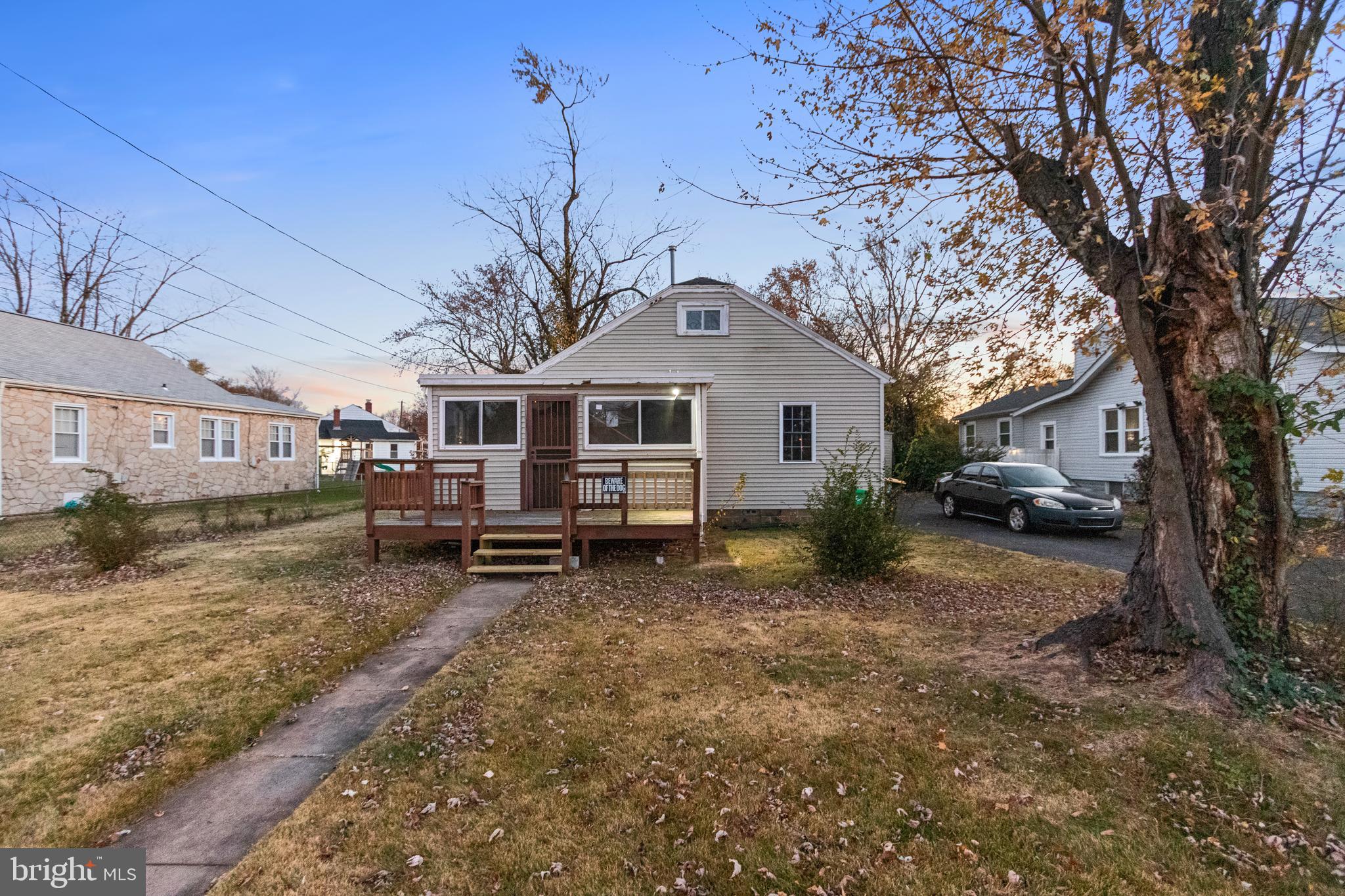 6009 Old Silver Hill Road District Heights, MD 20747 - Photo 1 of 24 a front view of a house with a yard