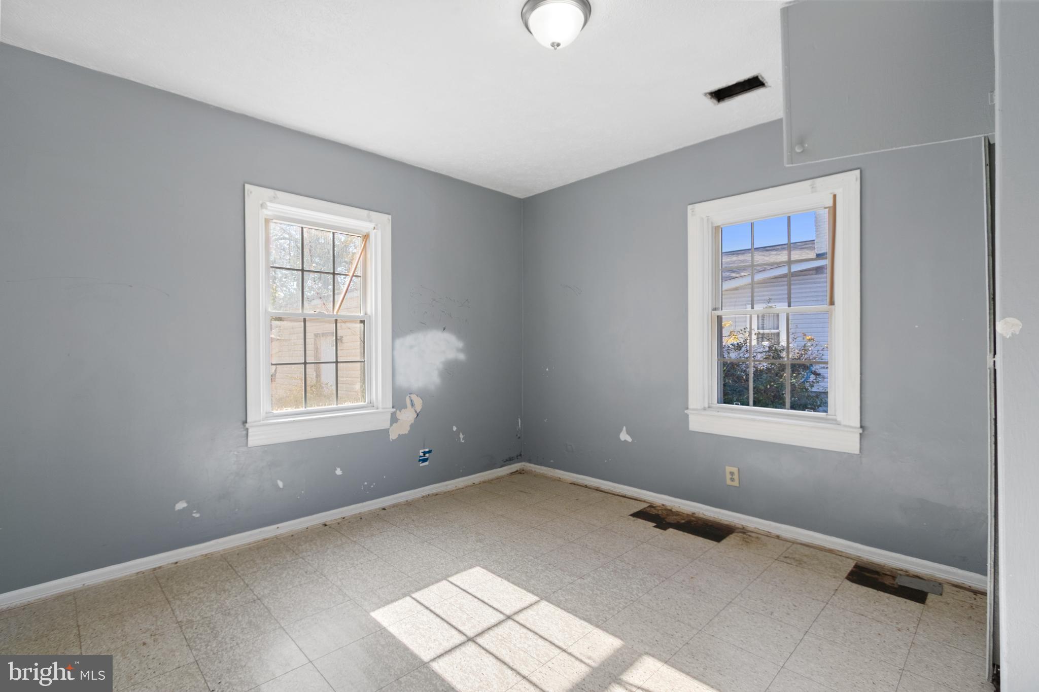 6009 Old Silver Hill Road District Heights, MD 20747 - Photo 15 of 24 an empty room with windows