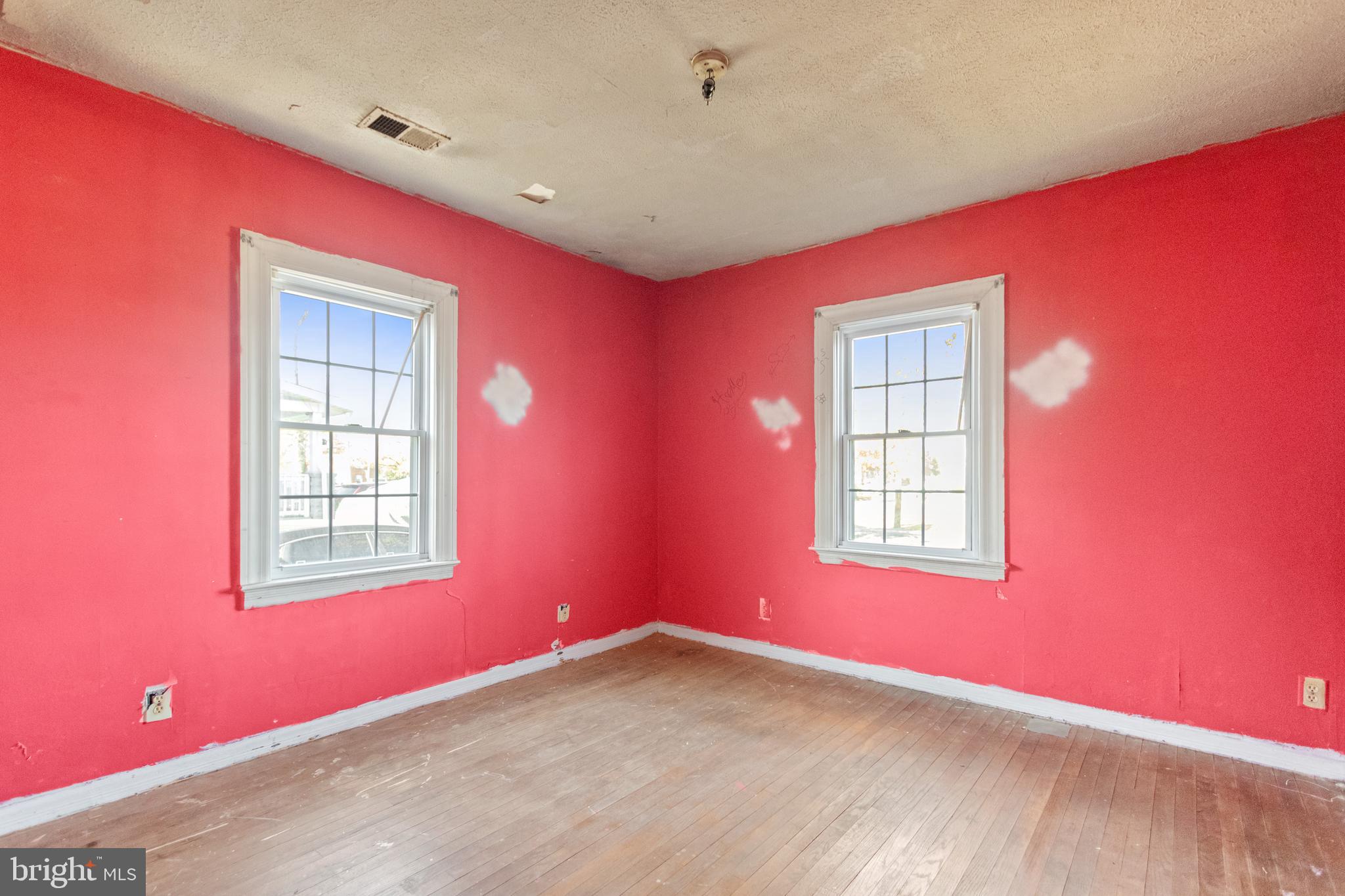 6009 Old Silver Hill Road District Heights, MD 20747 - Photo 17 of 24 a view of an empty room with windows