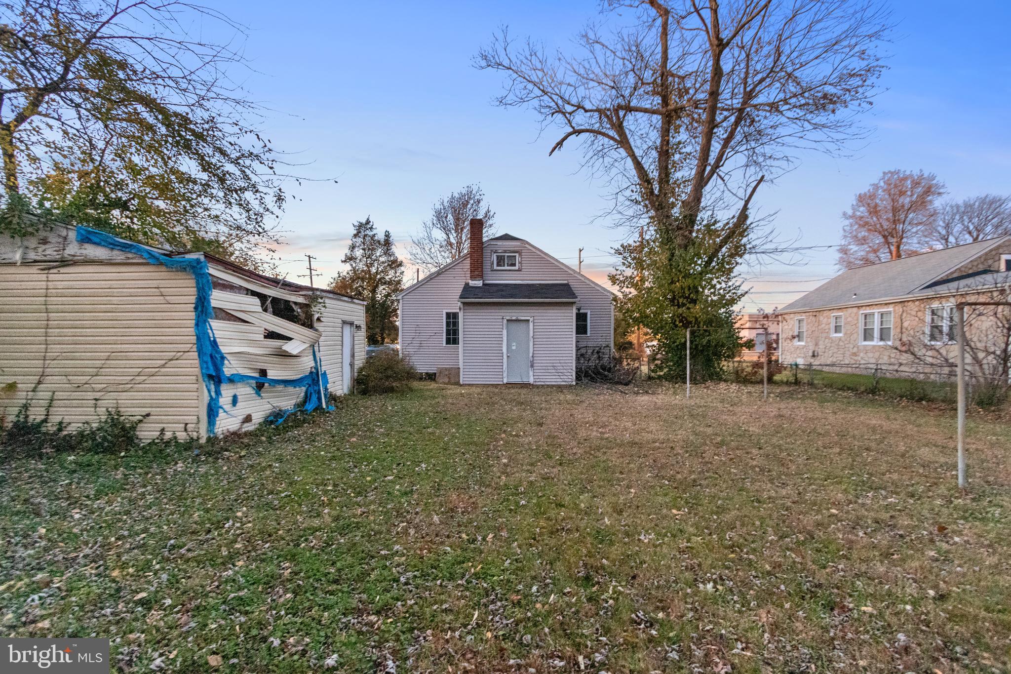 6009 Old Silver Hill Road District Heights, MD 20747 - Photo 23 of 24 a view of a house with a back yard