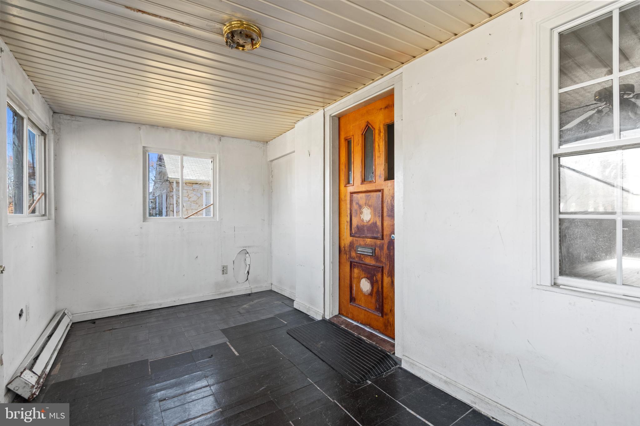 6009 Old Silver Hill Road District Heights, MD 20747 - Photo 3 of 24 an empty room with windows