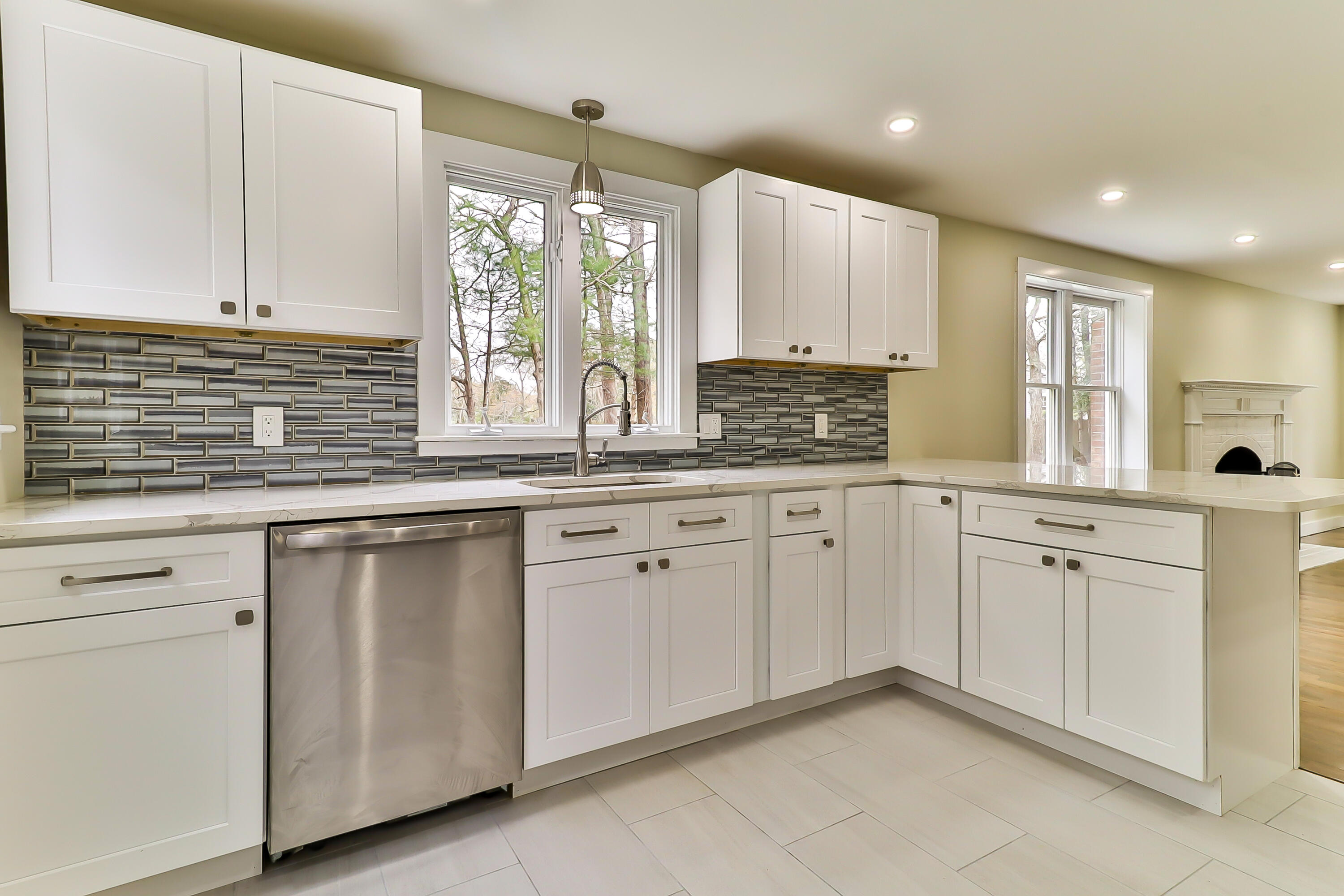 40 Richardson Road Centerville, MA 02632 - Photo 11 of 35 a kitchen with granite countertop white cabinets white appliances and sink