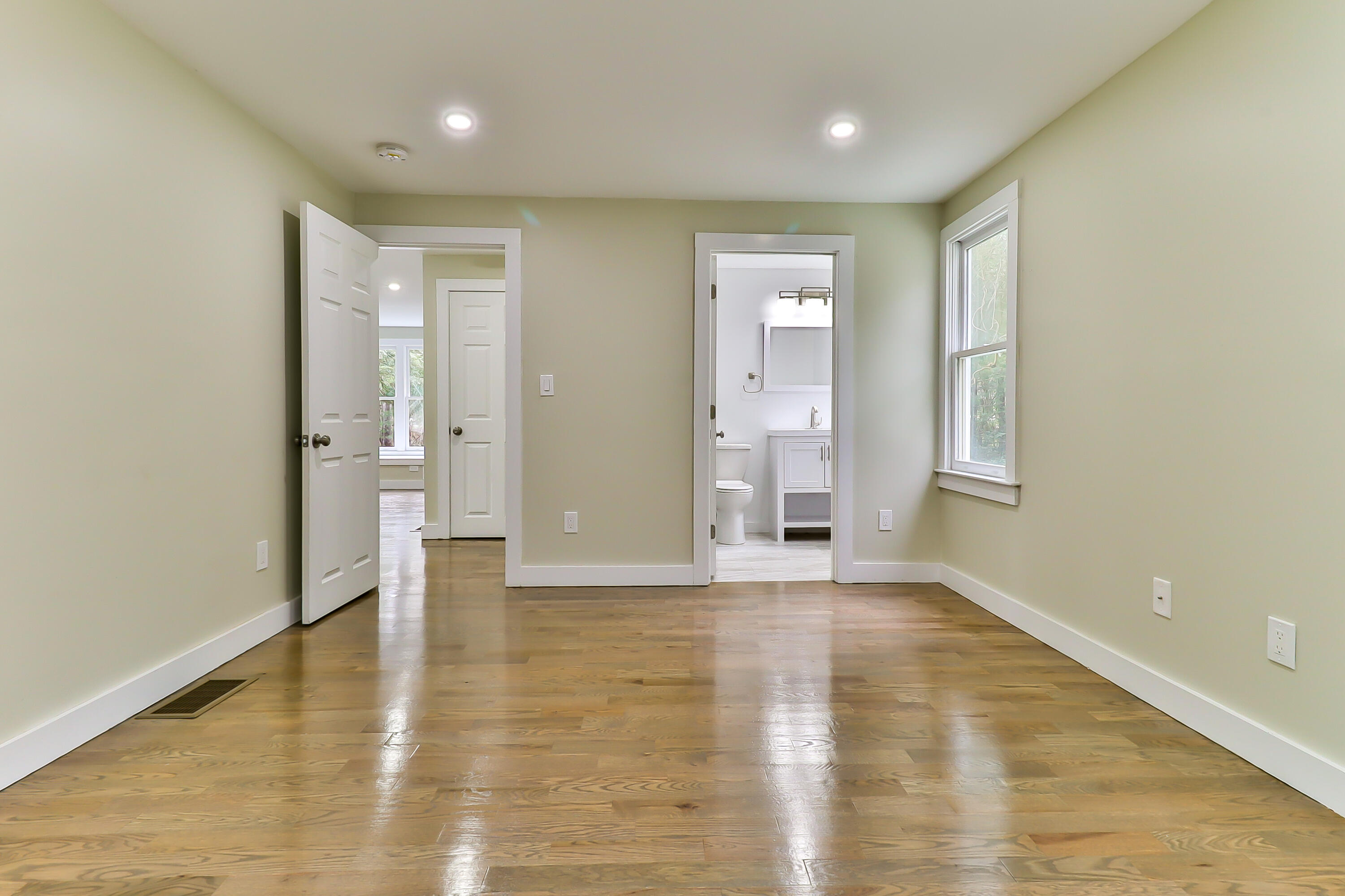40 Richardson Road Centerville, MA 02632 - Photo 15 of 35 a view of an empty room with wooden floor and a window