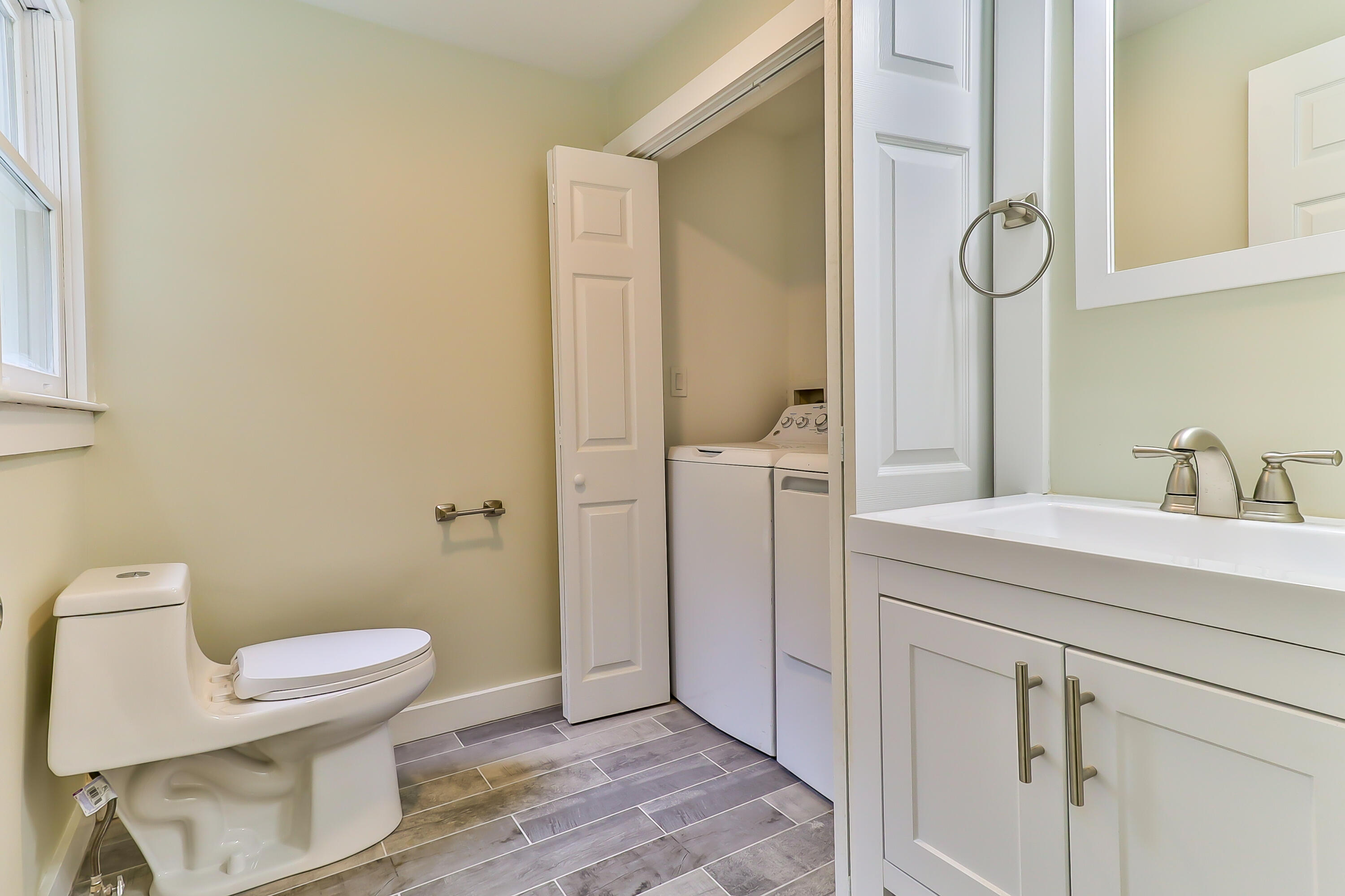40 Richardson Road Centerville, MA 02632 - Photo 18 of 35 a bathroom with a toilet sink and shower