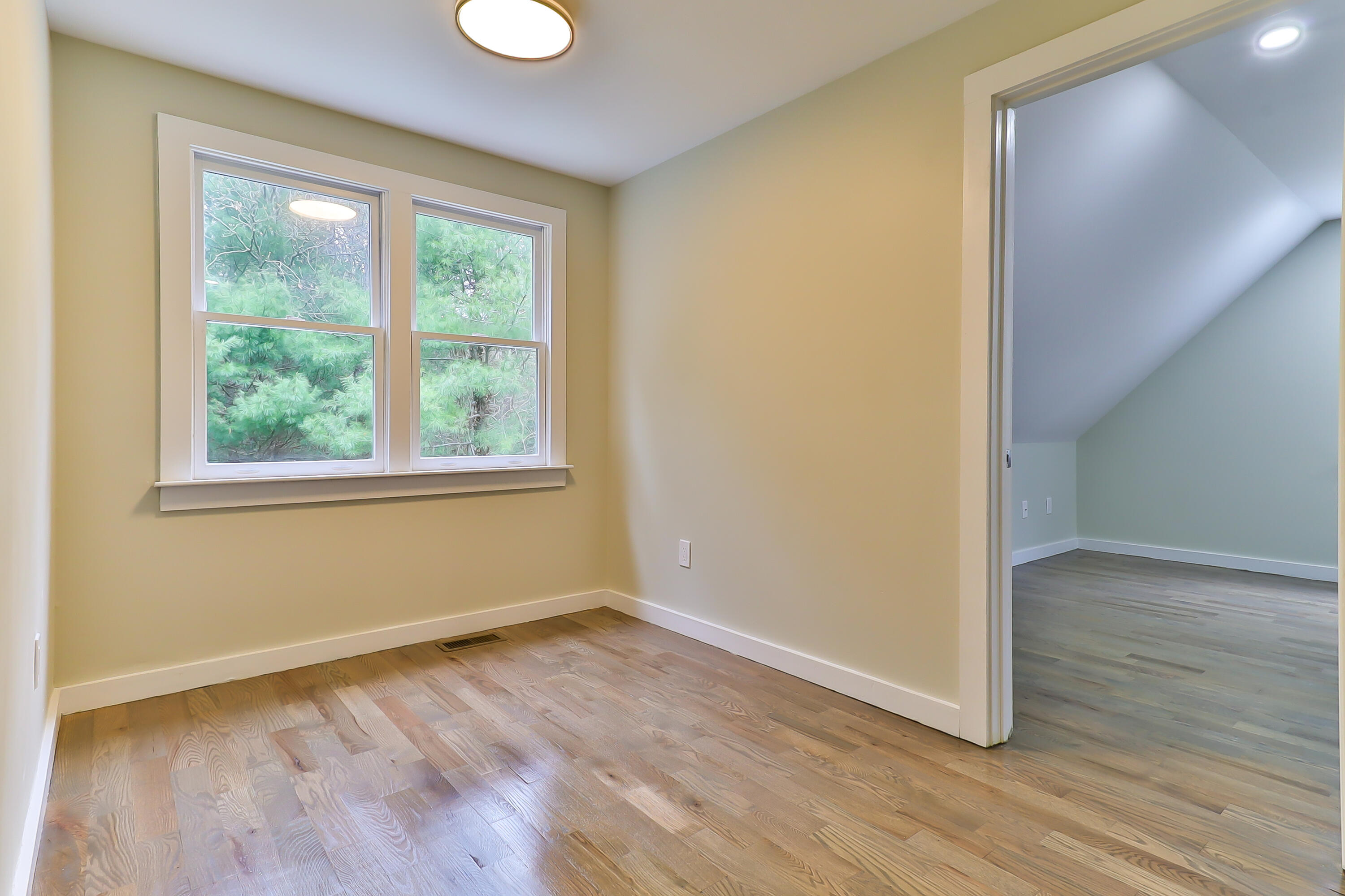 40 Richardson Road Centerville, MA 02632 - Photo 23 of 35 a view of an empty room with wooden floor and a window