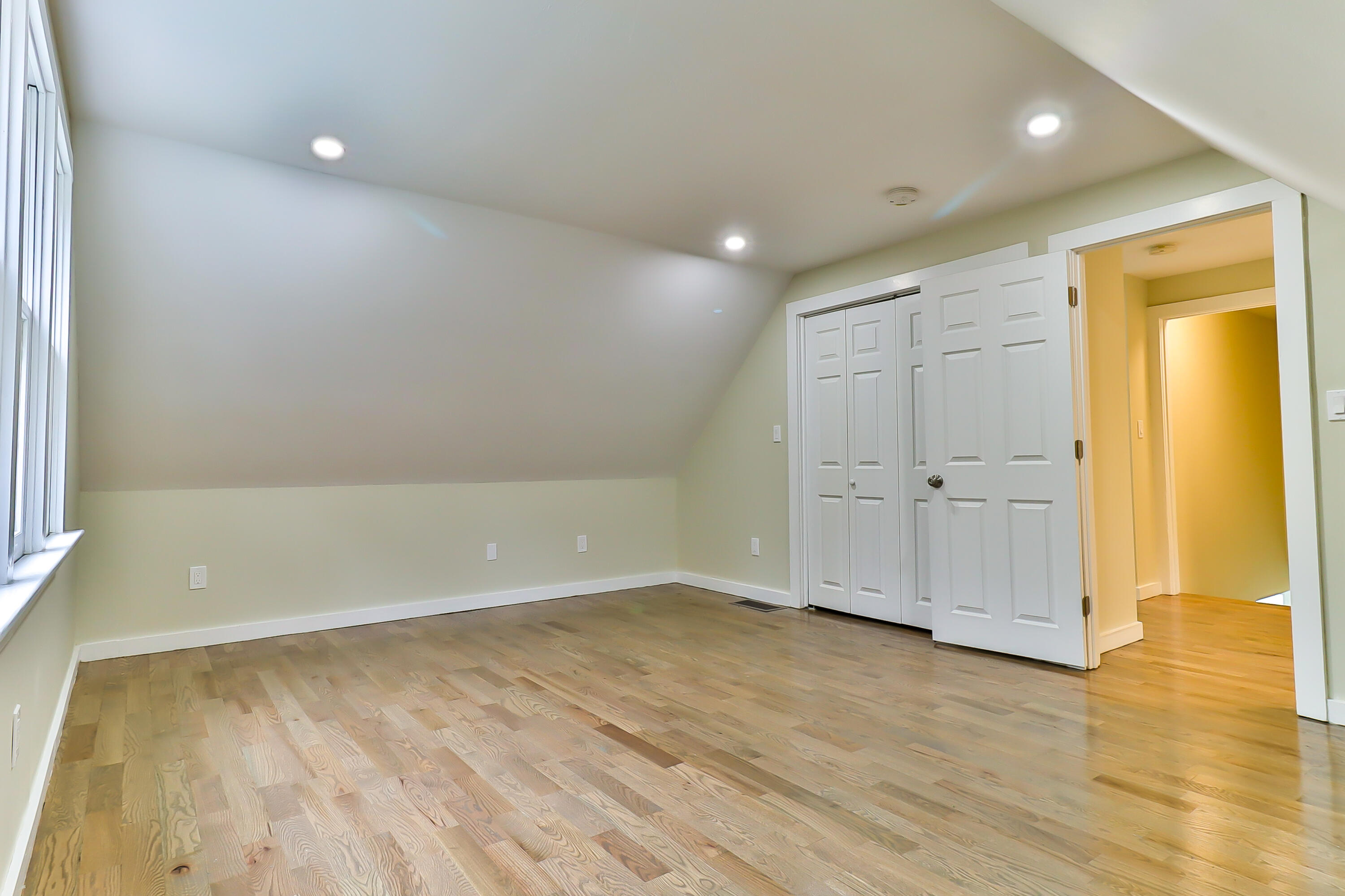 40 Richardson Road Centerville, MA 02632 - Photo 26 of 35 an empty room with wooden floor and windows