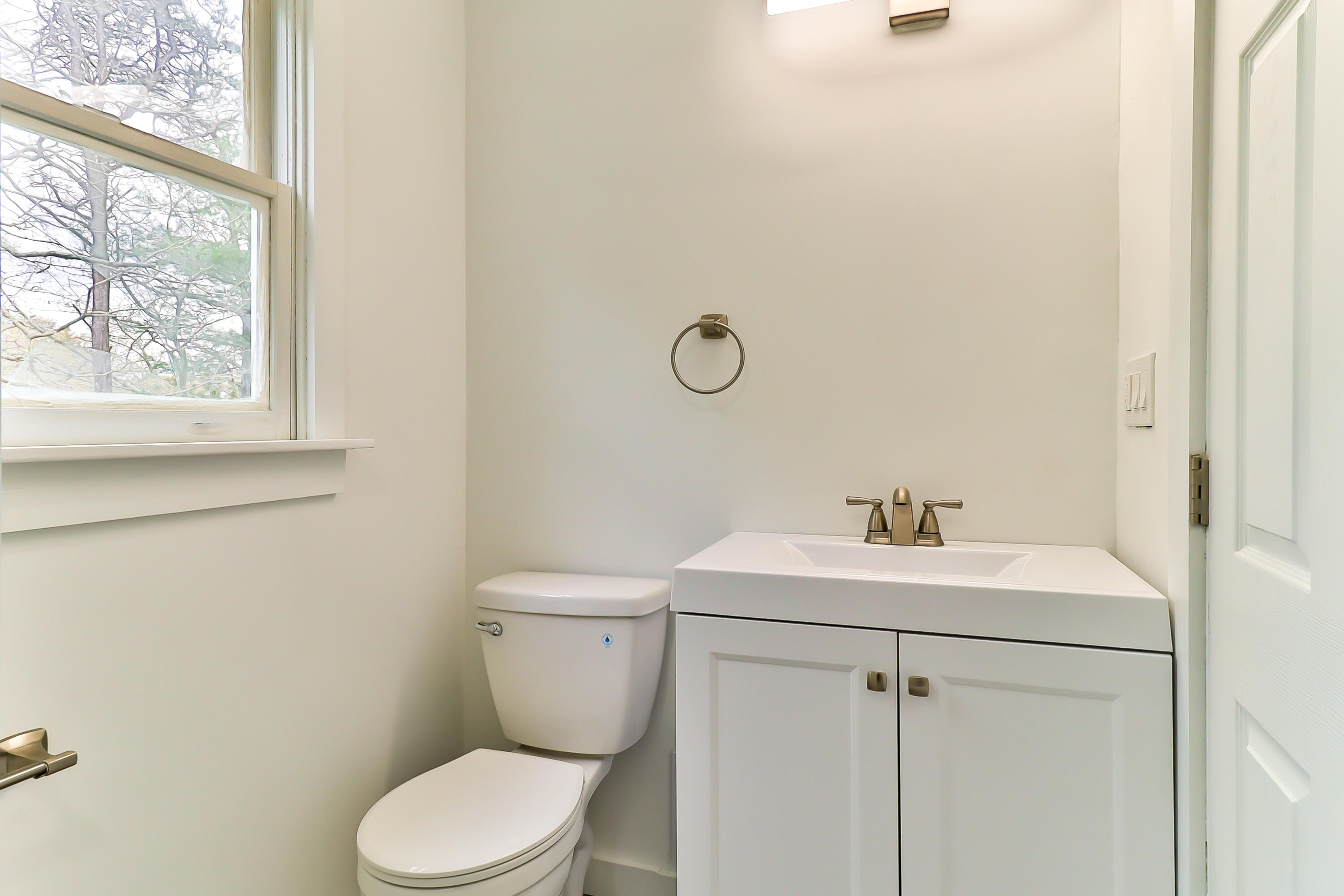 40 Richardson Road Centerville, MA 02632 - Photo 28 of 35 a white toilet sitting next to a bathroom sink