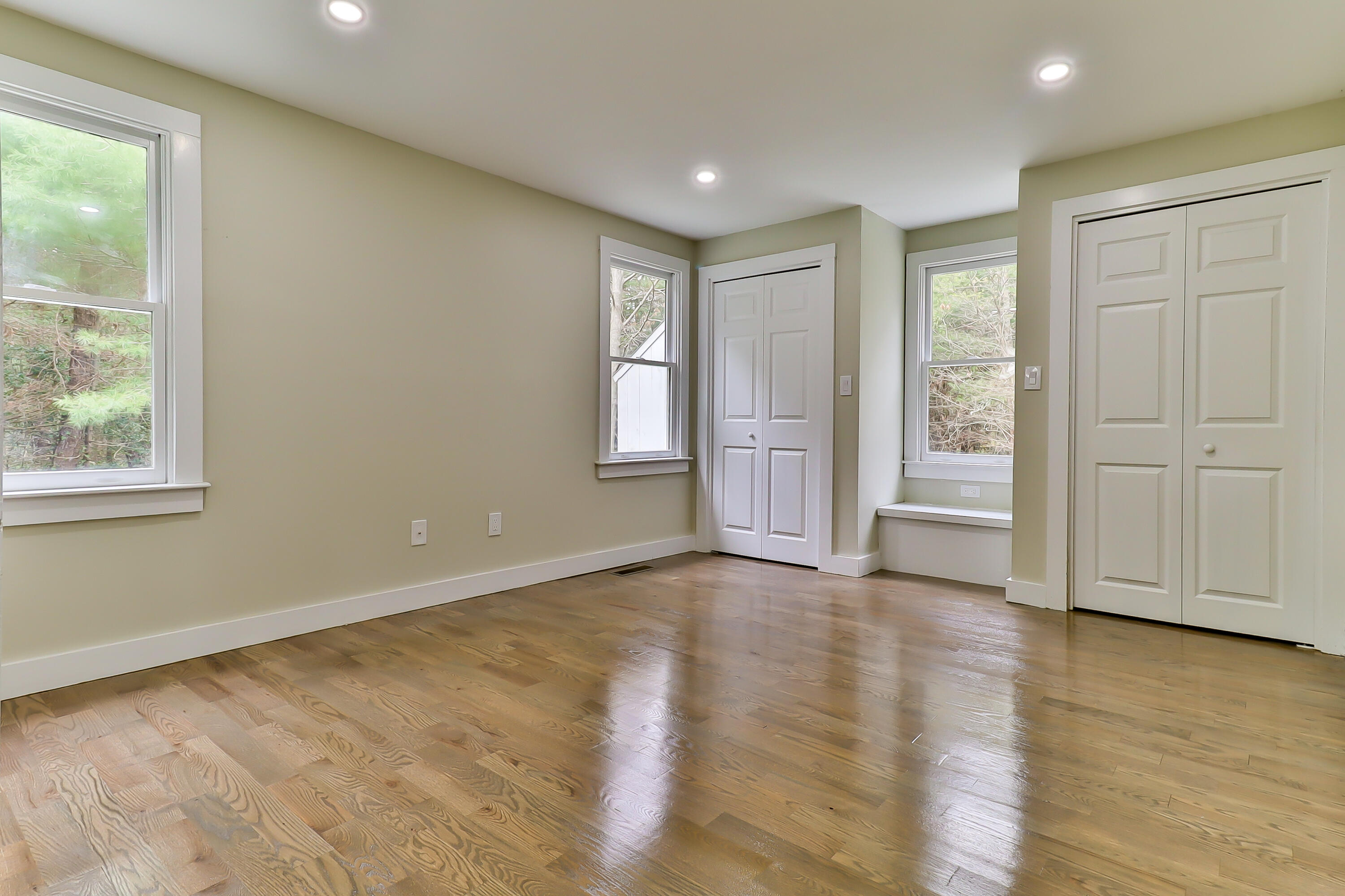 40 Richardson Road Centerville, MA 02632 - Photo 30 of 35 an empty room with wooden floor and windows