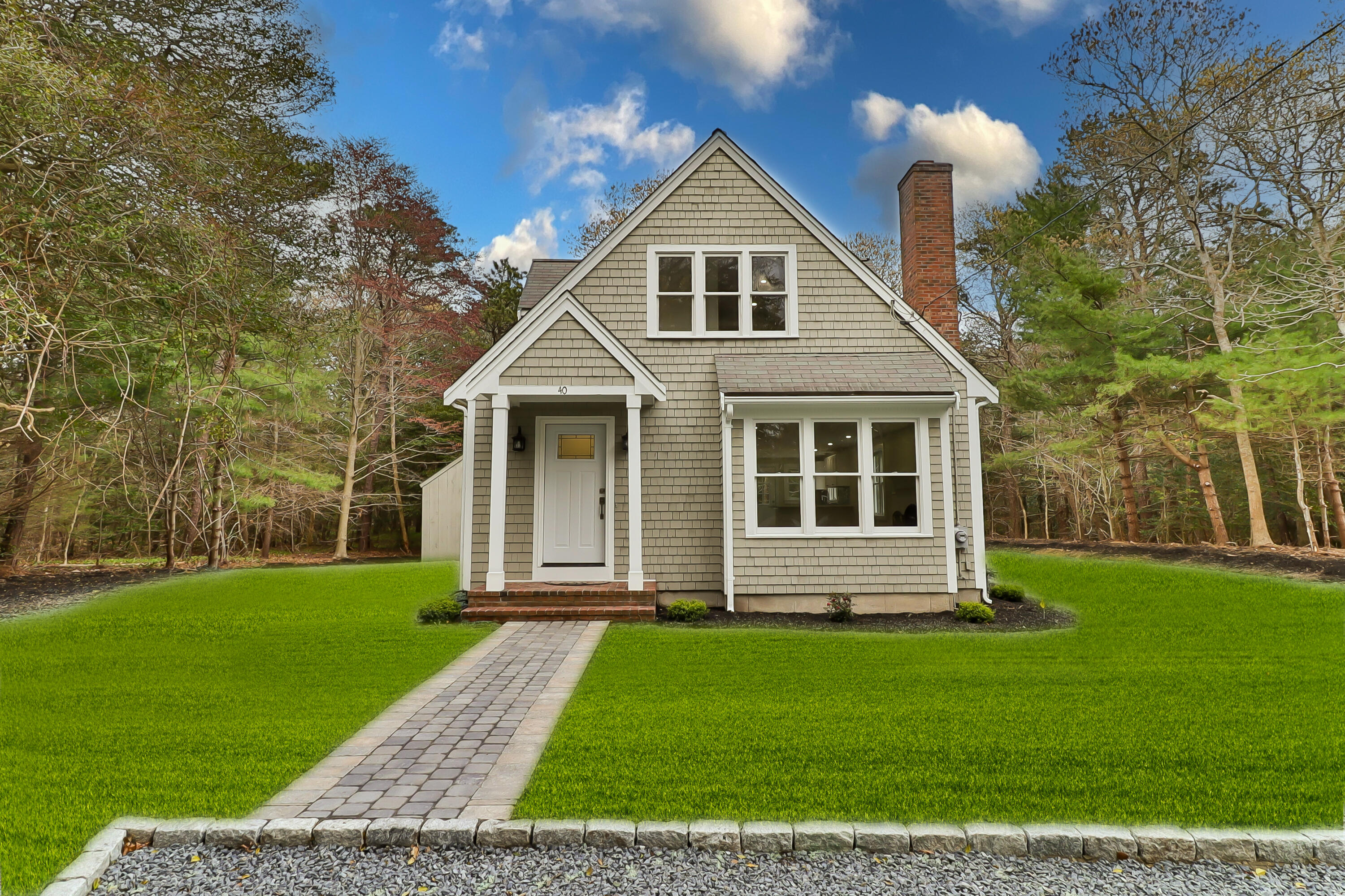 40 Richardson Road Centerville, MA 02632 - Photo 3 of 35 a front view of a house with a yard