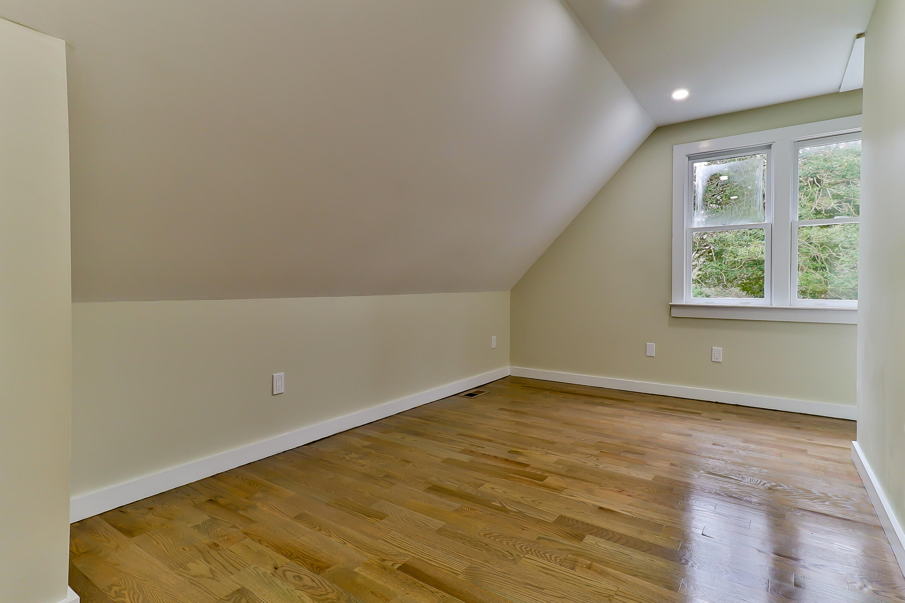40 Richardson Road Centerville, MA 02632 - Photo 32 of 35 an empty room with wooden floor and windows