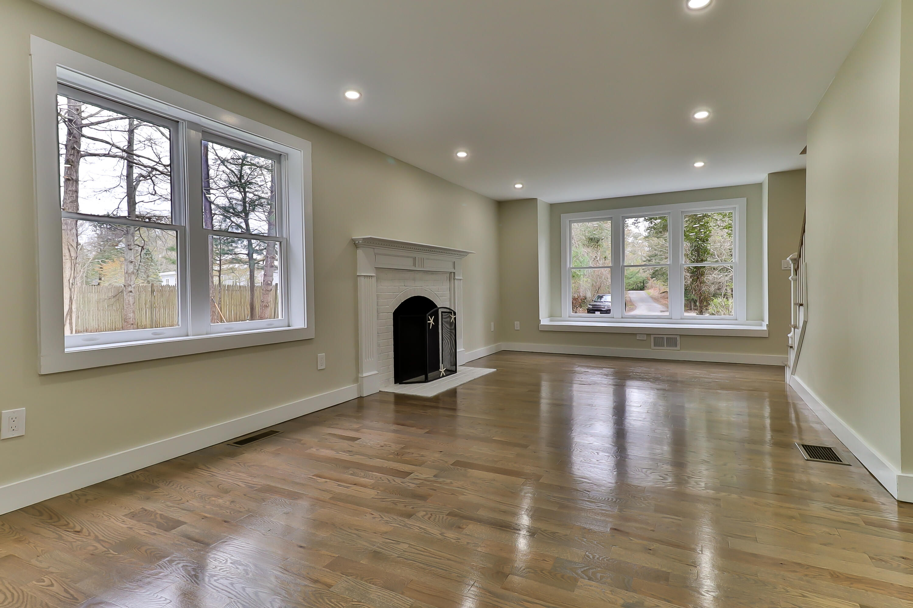 40 Richardson Road Centerville, MA 02632 - Photo 7 of 35 a view of an empty room with window and wooden floor