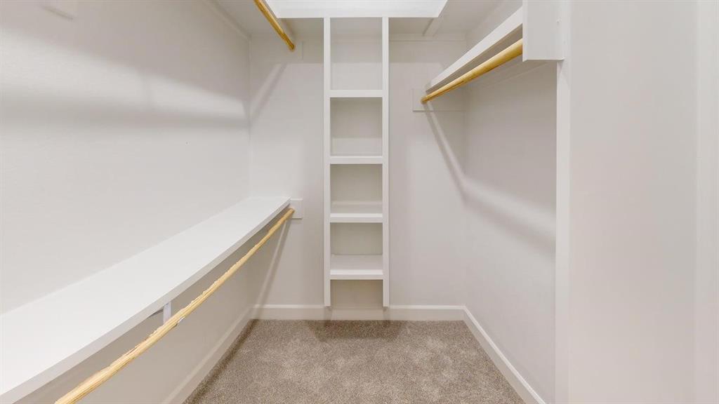 2509 Windmill Lane Longview, TX 75601 - Photo 30 of 35 Walk in closet featuring light carpet