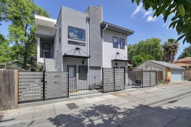 front view of a house with a street
