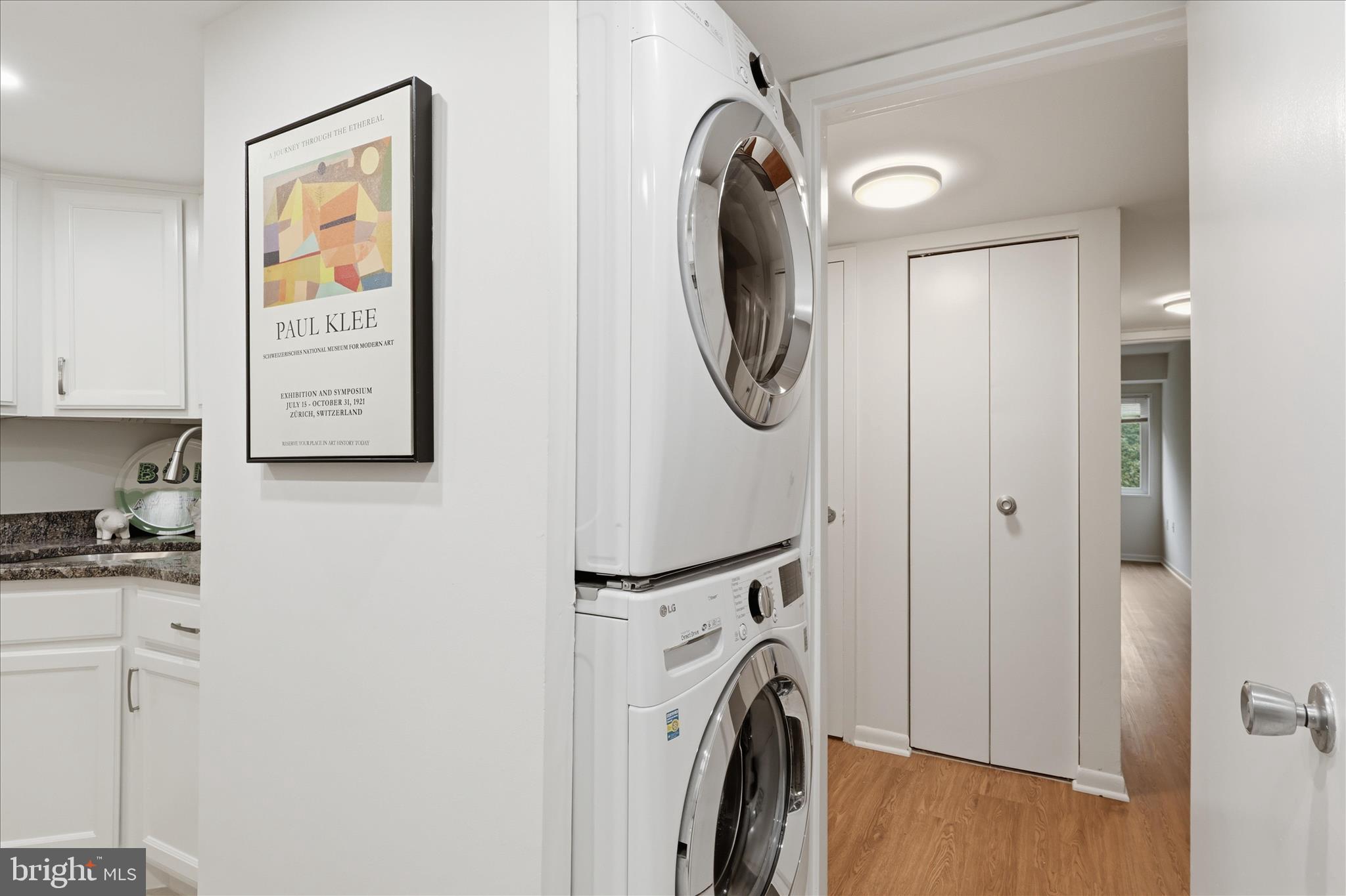1540 Northgate Square, Unit 21B Reston, VA 20190 - Photo 9 of 24 a utility room with dryer and washer