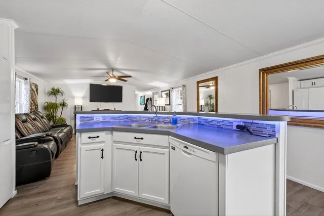 a view of a kitchen with electric appliances