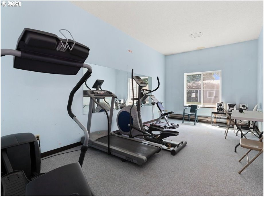 2712 Southeast 138th Avenue, Unit 53 Portland, OR 97236 - Photo 24 of 36 a view of a room with gym equipment