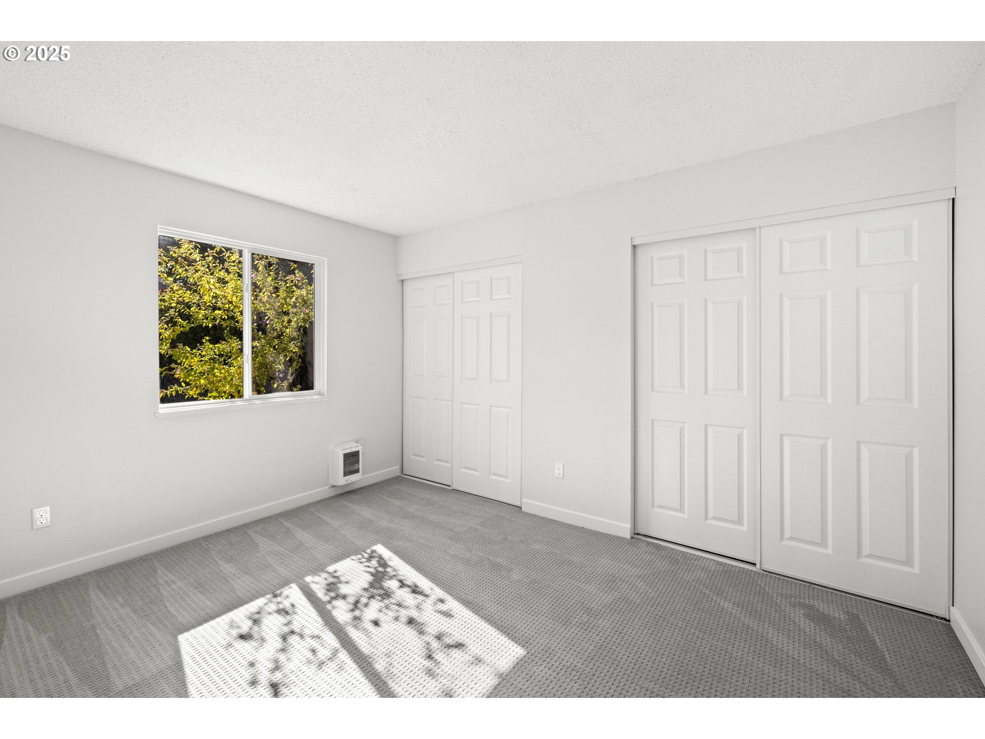2712 Southeast 138th Avenue, Unit 53 Portland, OR 97236 - Photo 30 of 36 a view of an empty room with a window