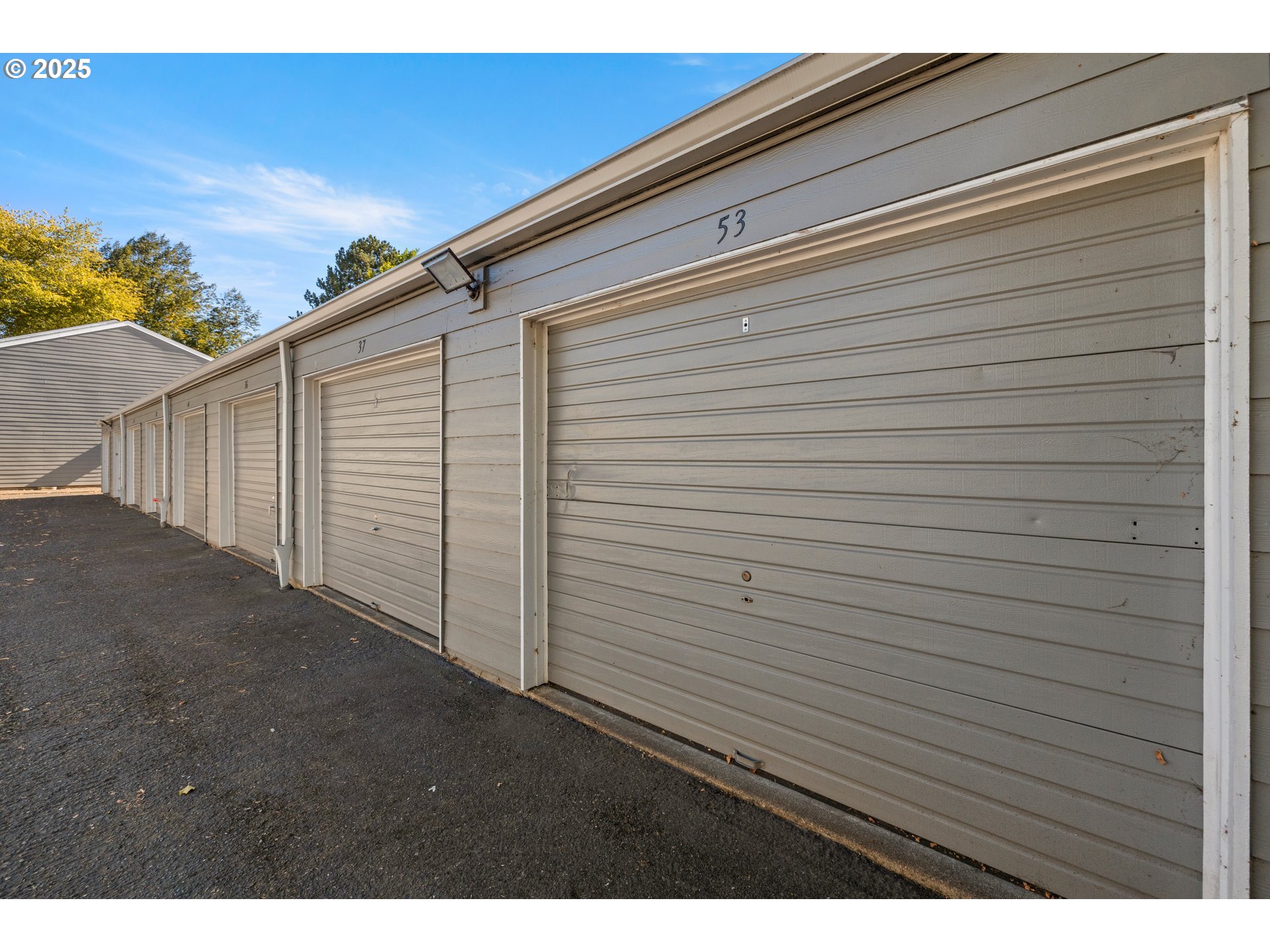 2712 Southeast 138th Avenue, Unit 53 Portland, OR 97236 - Photo 35 of 36 a view of a backyard