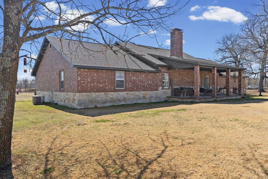 24 County Rd NW 1060 Talco, TX 75487 - Photo 29 of 40 a house view with a outdoor space