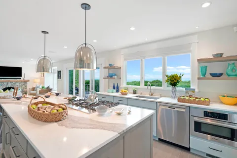 a kitchen with sink and stove