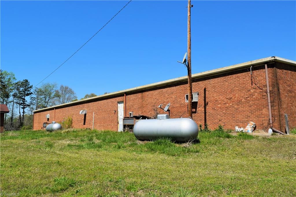 490 K Fork Road Madison, NC 27025 - Photo 5 of 30 Exterior Back Main Building