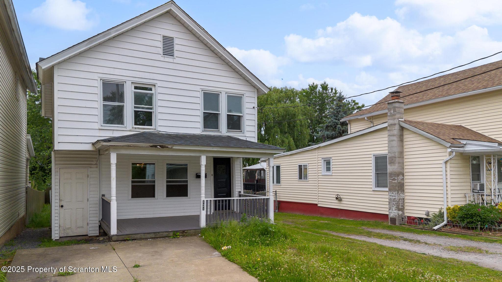 121 Throop Street Scranton, PA 18508 - Photo 1 of 37 a view of a house with backyard