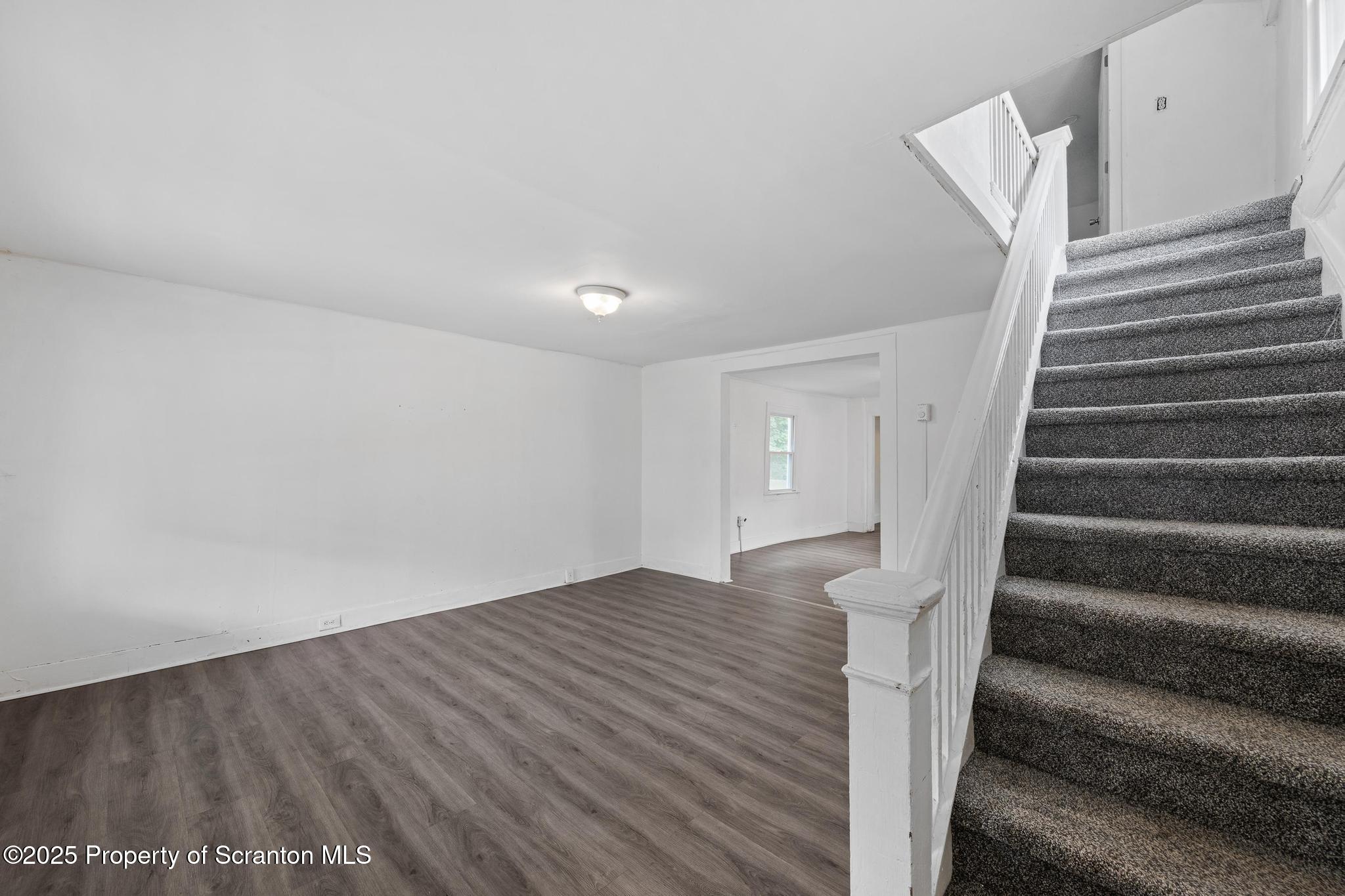 121 Throop Street Scranton, PA 18508 - Photo 13 of 37 a view of entryway with wooden floor