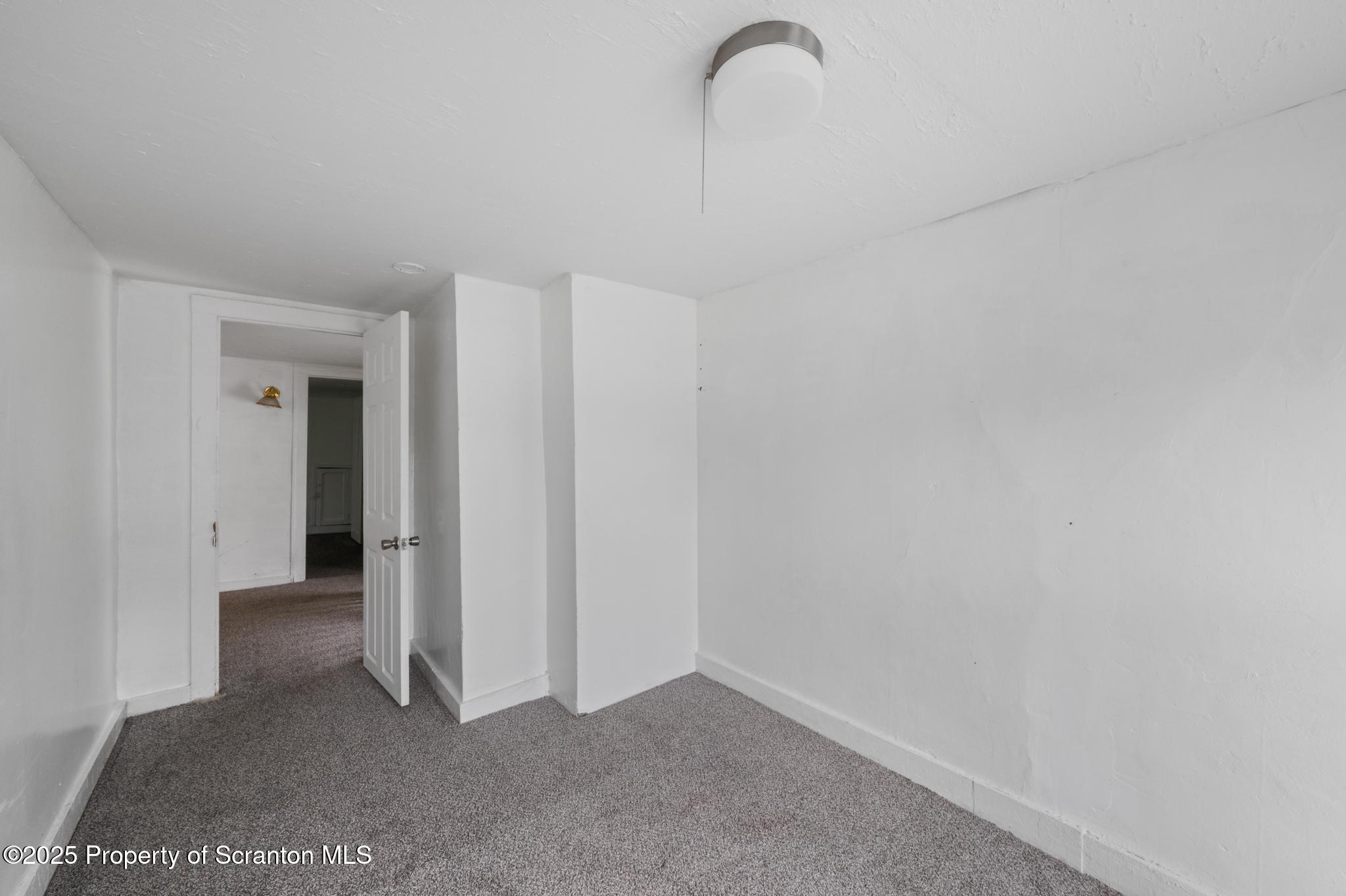 121 Throop Street Scranton, PA 18508 - Photo 31 of 37 a view of a room with a barbeque