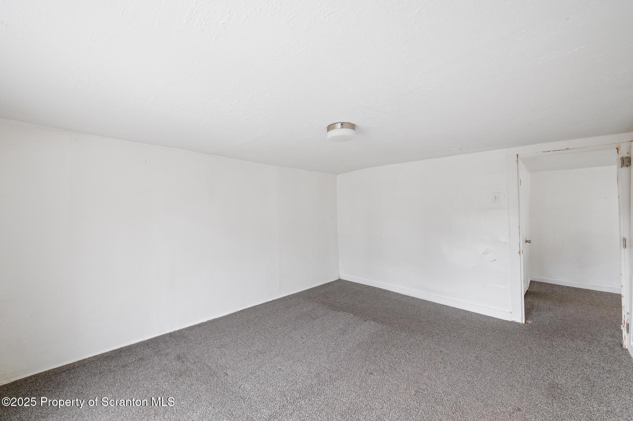 121 Throop Street Scranton, PA 18508 - Photo 33 of 37 a view of an empty room