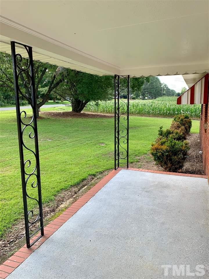3539 Meadowlark Road Dunn, NC 28334 - Photo 3 of 25 a view of a garden with plants