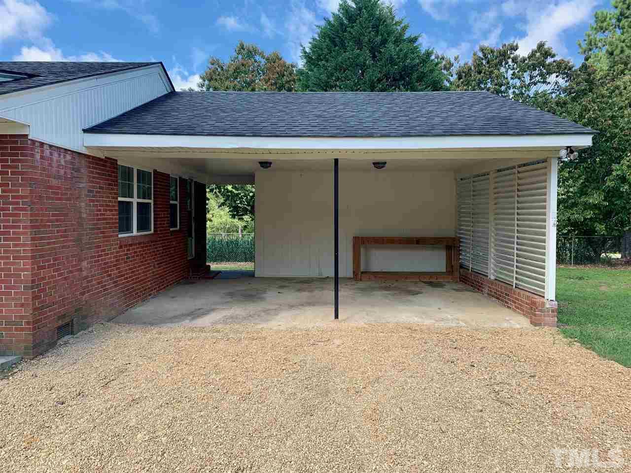 3539 Meadowlark Road Dunn, NC 28334 - Photo 22 of 25 a view of house with outdoor space