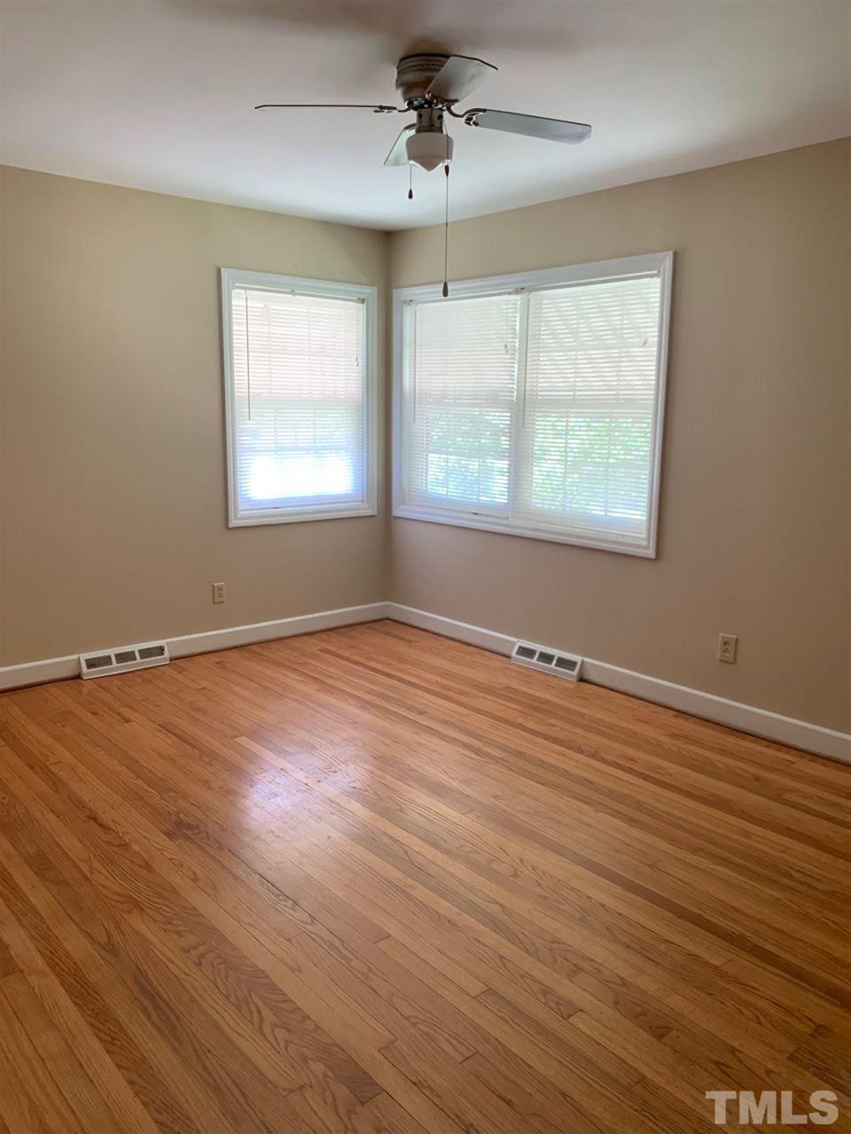 3539 Meadowlark Road Dunn, NC 28334 - Photo 25 of 25 wooden floor in an empty room with a window