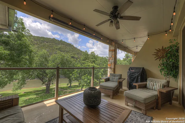 a view of a couches in the balcony