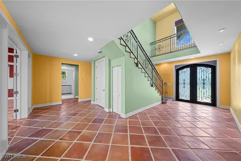 a view of a hallway with windows