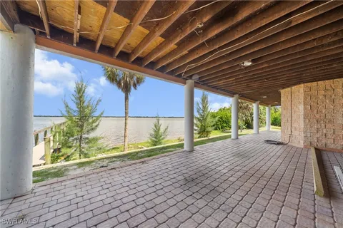 a view of porch with a bench