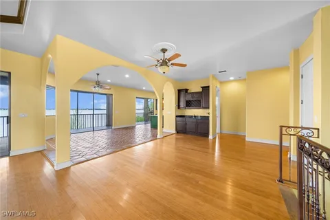 a view of a kitchen with a stove cabinets and a kitchen