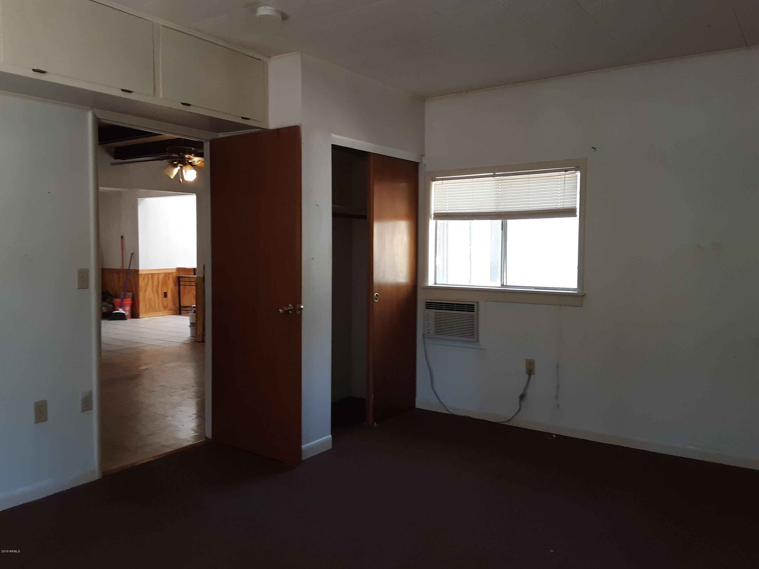 6137 B Street Lakeside, AZ 85929 - Photo 14 of 16 a view of an empty room with a window