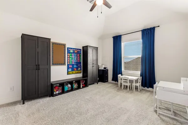 a view of a livingroom with furniture and window